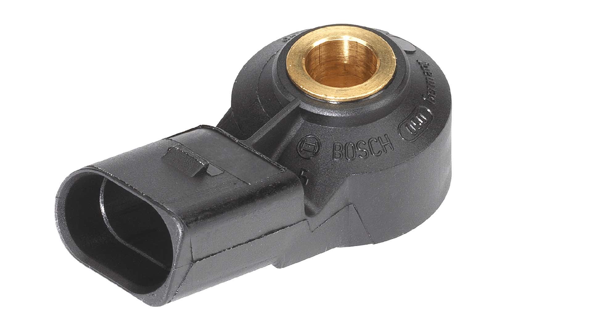 A knock sensor monitors irregular cylinder ignitions 爆震传感器监测不规则的汽缸点火