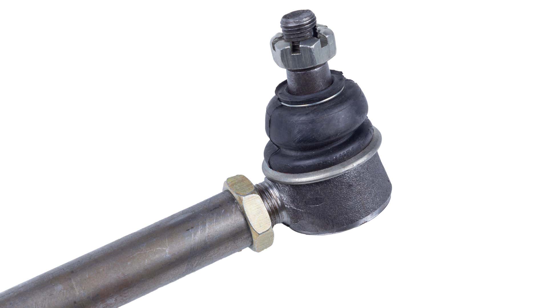 A tie rod end on a white backdrop. 白色背景上的拉杆末端。